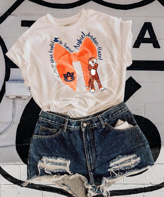 ‘UA’ Orange Bow Completed Tee